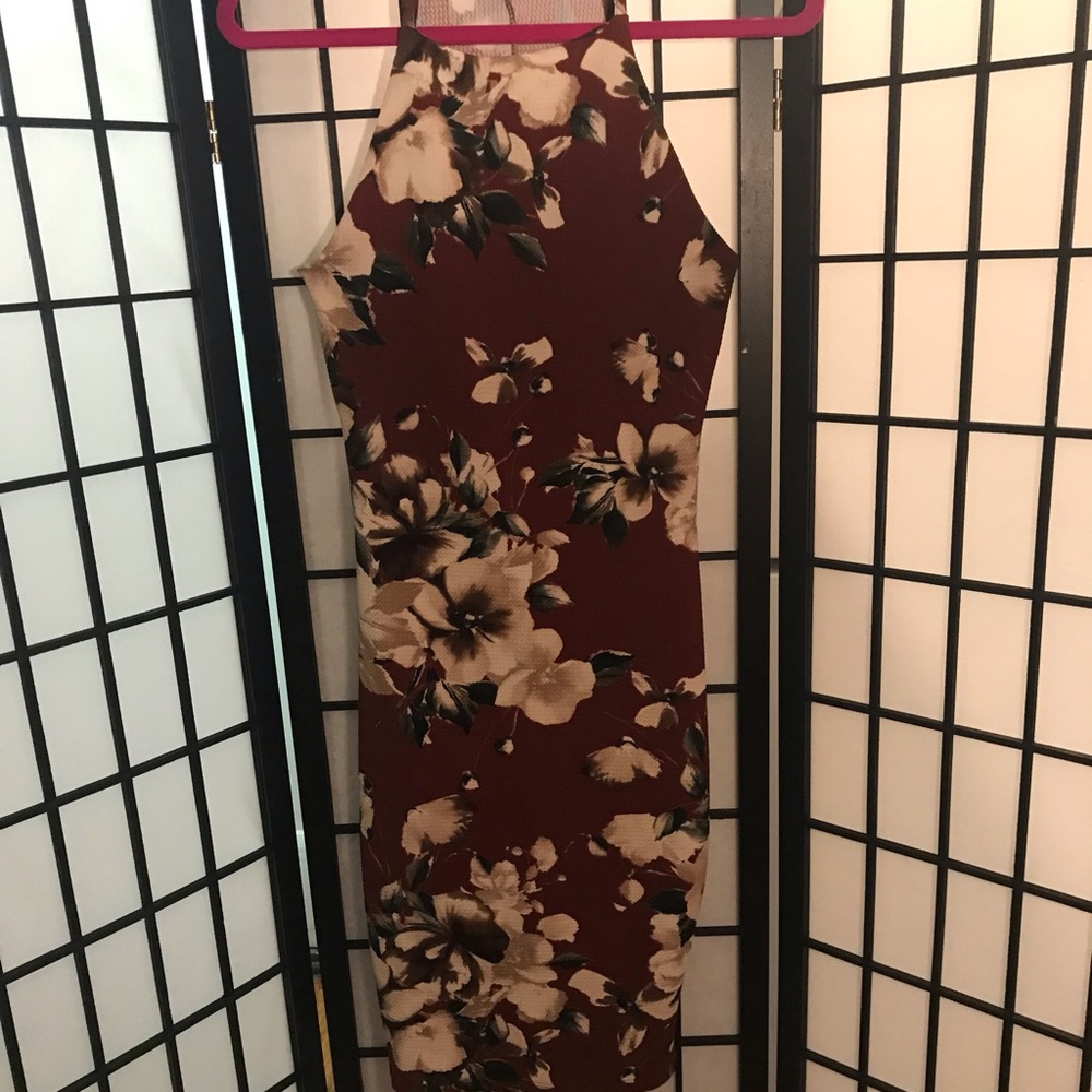 Floral burnt orange body con dress.